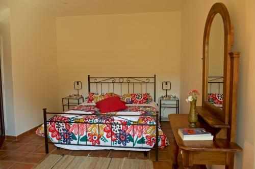Una cama o camas en una habitación de Agriturismo Le Folaghe