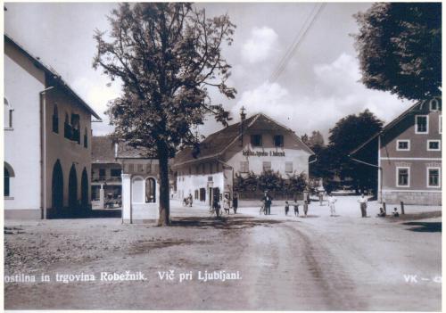 an old black and white photo of a street in a town at Pri Žabarju Bed & Breakfast Ljubljana in Ljubljana