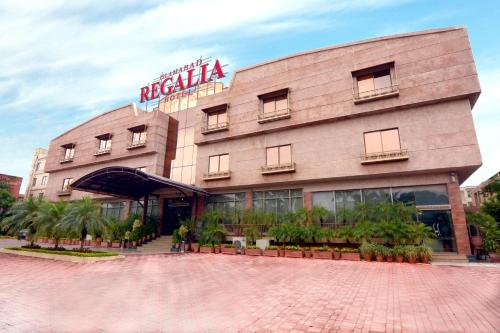 a building with a sign that reads metroilla at Islamabad Regalia Hotel in Islamabad