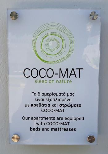 a sign for a coo matt sleep on nature at apt.27-103 in Nafplio