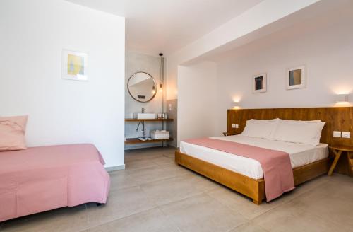 Hotel Ippocampos Studiosにあるベッド