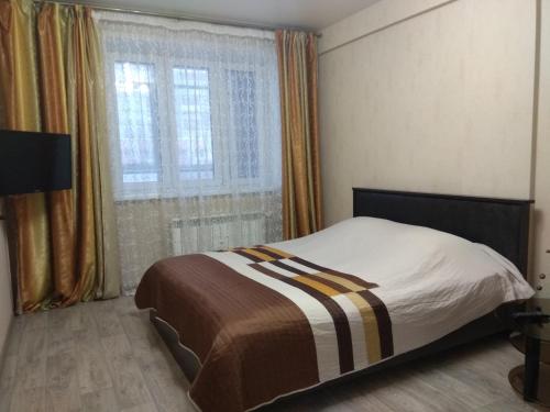  Кровать или кровати в номере Druzhba Narodov 5 