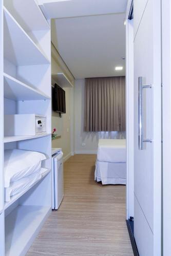 Uma cama ou camas num quarto em Hotel Domani