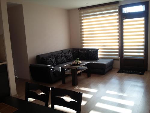Ruang duduk di Guest House Ideal