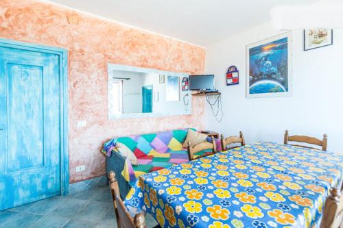 A bed or beds in a room at On The Beach La Rena Beddha