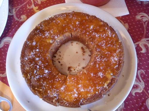 a pancake on a plate on a table at Country House La Perla del Sile in Sant'Elena di Silea