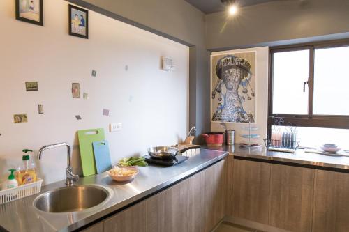 Una cocina o cocineta en DoMo Yilan