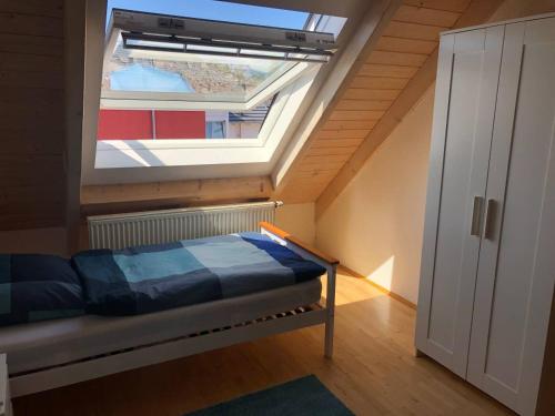 Postel nebo postele na pokoji v ubytování Ferienwohnung Ankerplatz Bodensee