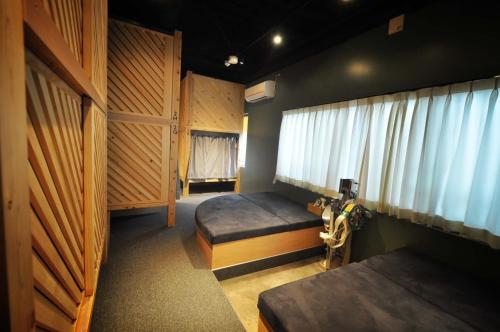 Кровать или кровати в номере SINGAI CABIN