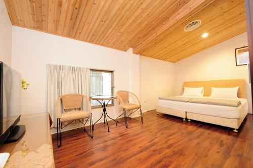 Una cama o camas en una habitación de Homeinn
