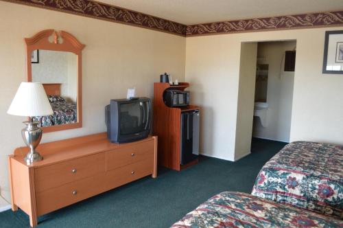Gateway Inn Fairfieldにあるベッド