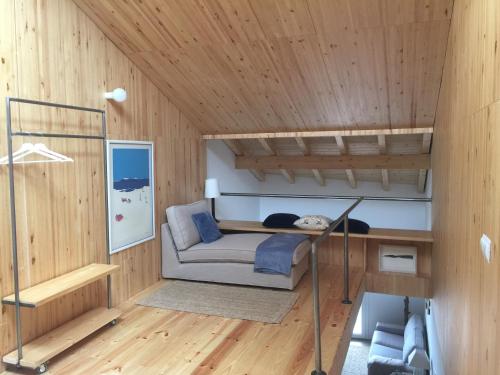 a small room with a bunk bed in a house at La Holandesa in Cercedilla