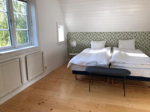 Postel nebo postele na pokoji v ubytování Cosy river house
