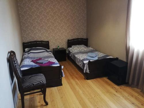 Una cama o camas en una habitación de Colourful Udabno