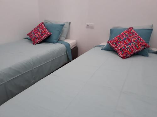 Postel nebo postele na pokoji v ubytování Vivienda Casa Mary