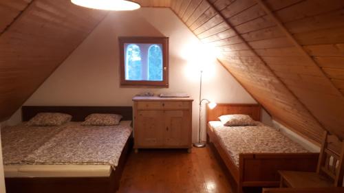 Ένα ή περισσότερα κρεβάτια σε δωμάτιο στο Káli 120