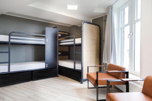 Una cama o camas en una habitación de Generator Hamburg