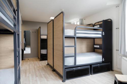 Una cama o camas en una habitación de Generator Hamburg