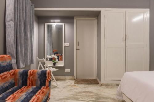 Ein Bett oder Betten in einem Zimmer der Unterkunft Woke HSR layout