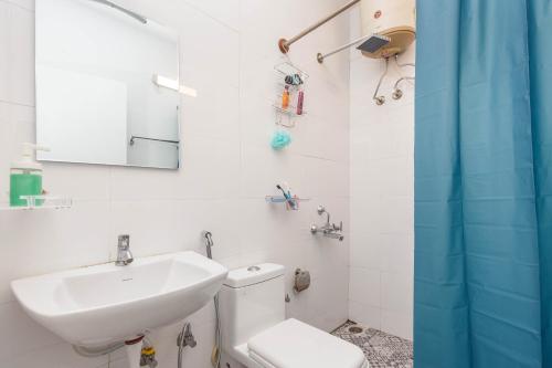 Ein Badezimmer in der Unterkunft Woke HSR layout