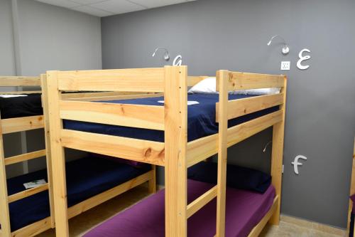 a couple of bunk beds in a room at Alda Estella Hostel in Estella