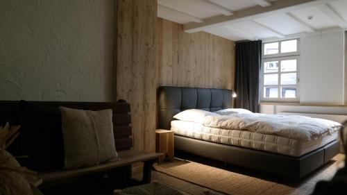 Tempat tidur dalam kamar di Holiday House BURGBLICK2 with garden - VOSPROPERTIES