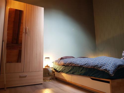 Postel nebo postele na pokoji v ubytování Studio Duplex Place de la Grenette