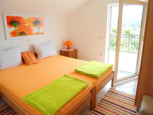 Voodi või voodid majutusasutuse Apartments Slavica Trogir toas