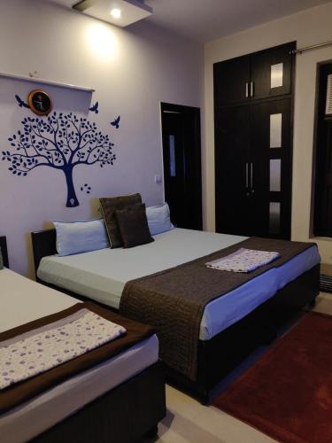 Cama ou camas em um quarto em Pearl Premium Homes, Family BnB Guest-House