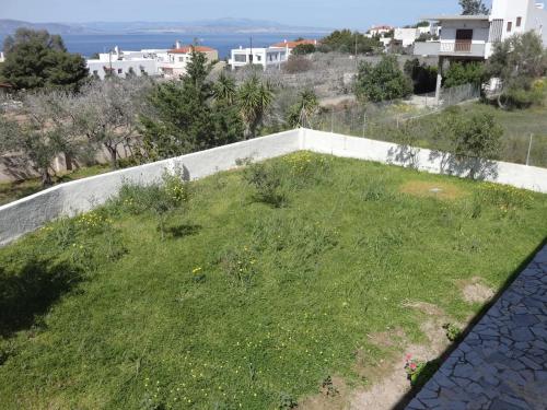 a grassy area on the roof of a house at Sun and Sea in Souvala