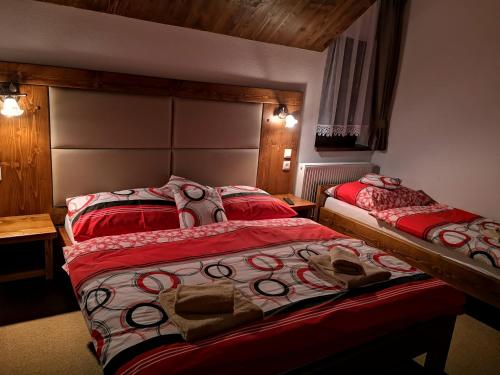 Ein Bett oder Betten in einem Zimmer der Unterkunft Privát Bachleda Ždiar