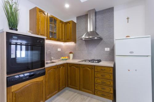 Η κουζίνα ή μικρή κουζίνα στο Apartman Ino