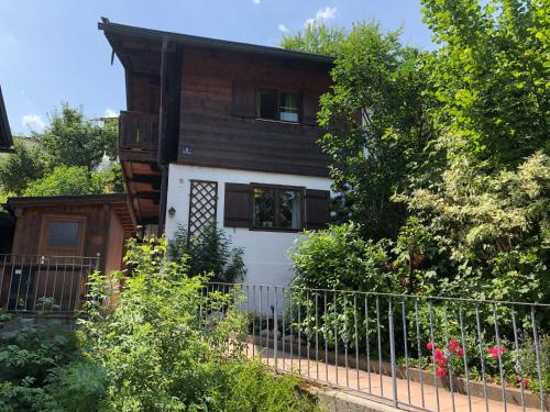 a house with a fence in front of it at Chalet am Hasensprung in Berchtesgaden