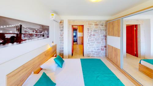 Postel nebo postele na pokoji v ubytování Luka Villa