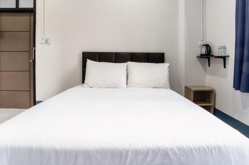 Udomsuk Hotelにあるベッド