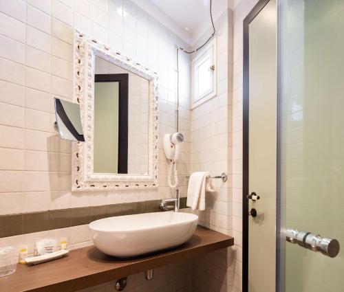 Koupelna v ubytování Best Western Maison B Hotel