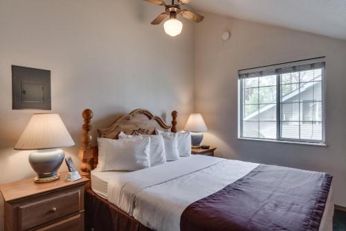 a bedroom with a large bed and a window at Turning Leaf Townhome Suites in Spokane