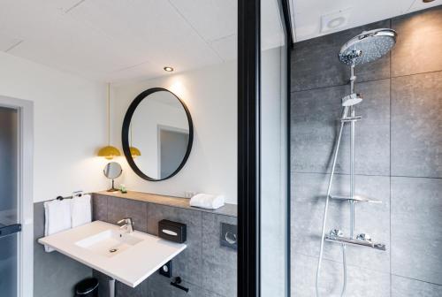 Et badeværelse på Fjordgaarden - Kurbad - Hotel - Konference
