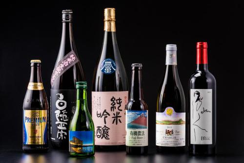 a group of bottles of wine on a table at Izu Mitohama Shotokan in Numazu