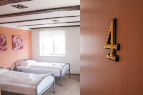 Postel nebo postele na pokoji v ubytování Penzion SLANINA