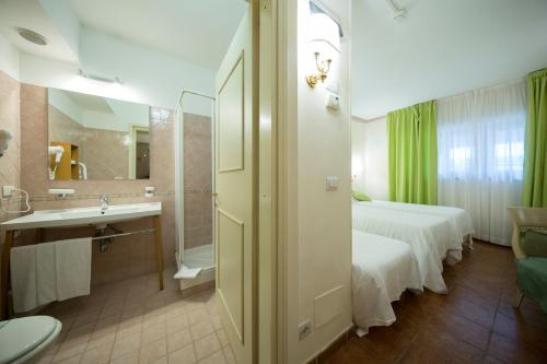 Koupelna v ubytování Mancini Park Hotel