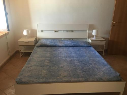 Postel nebo postele na pokoji v ubytování Bellano Casa Elena