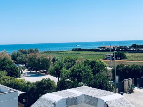 a view of the ocean from the roof of a house at Casamare 83 in Torre Canne