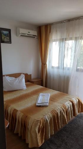 Una cama o camas en una habitación de Riviera Valceana