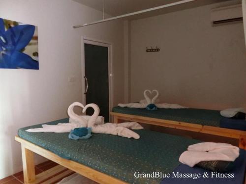 Letto o letti in una camera di Grand Blue Condominium 509 Mea Phim Beach, Klaeng, Rayong, Thailand