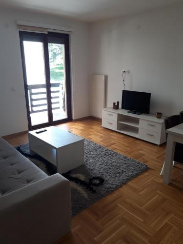 Et tv og/eller underholdning på MD Apartman