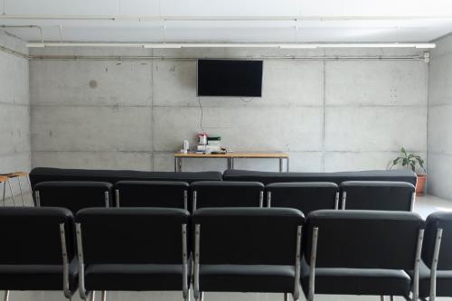 Télévision ou salle de divertissement dans l'établissement Residència Universitària Sant Joan