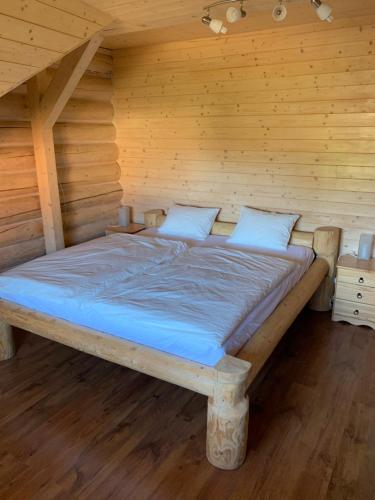 Postel nebo postele na pokoji v ubytování Srub Bublava 155