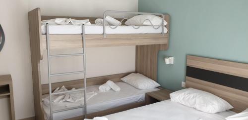 Ένα ή περισσότερα κρεβάτια σε δωμάτιο στο Chriselia 4