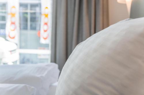 Postel nebo postele na pokoji v ubytování Apartment JungfrauCenter Roteflue - GRIWA RENT
